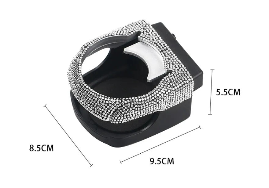 Diamond-decorated car cup holder bracket mounted on air vent in blue rhinestone finish
