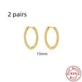 Twisted string round ring earrings in sterling silver with gold plating