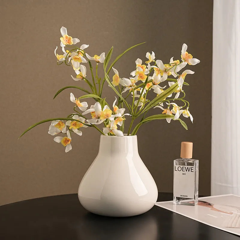 Ceramic vase with glass surface in black or white colour featuring coloured glaze finish and modern simple style