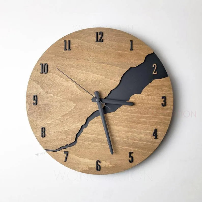 Modern wooden wall clock with a white crack design on a coloured background.