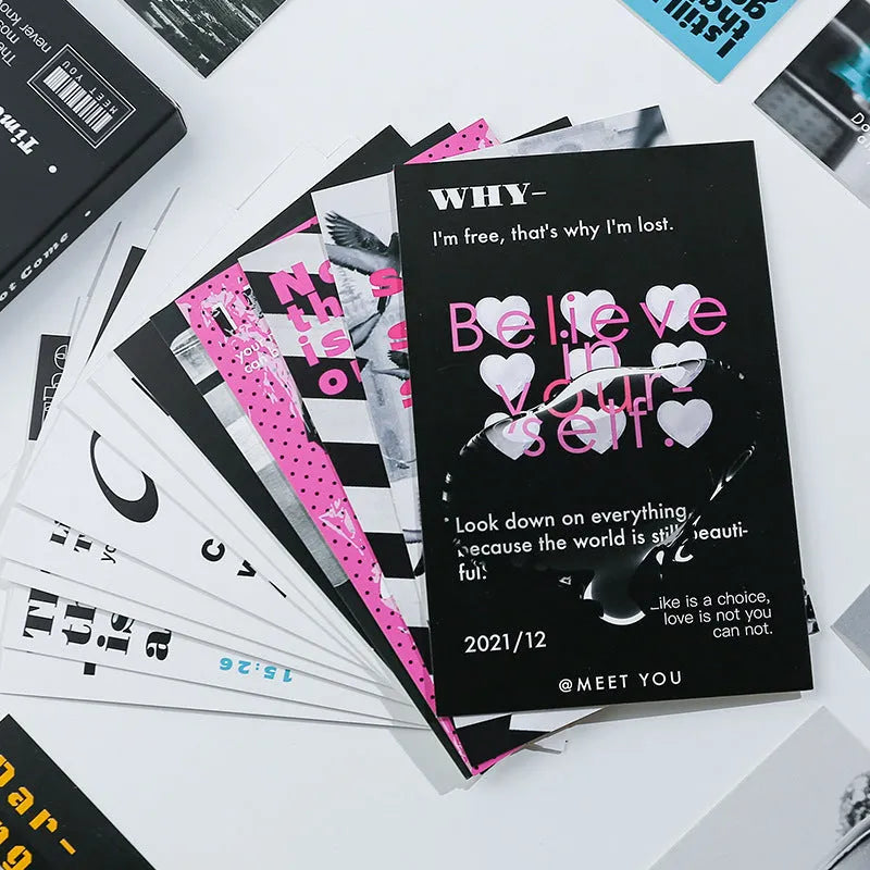 Box containing two creative printed postcard designs: Time Not Arrived and Warm Wind Not Exhausted.