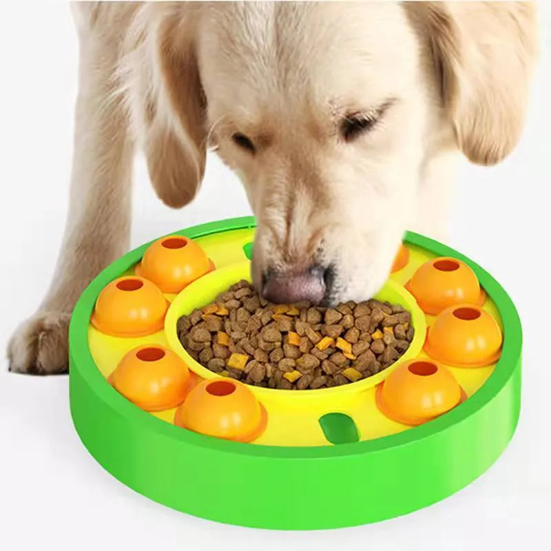 Lake blue interactive dog slow feeder bowl with central column and food turntable on a floor.