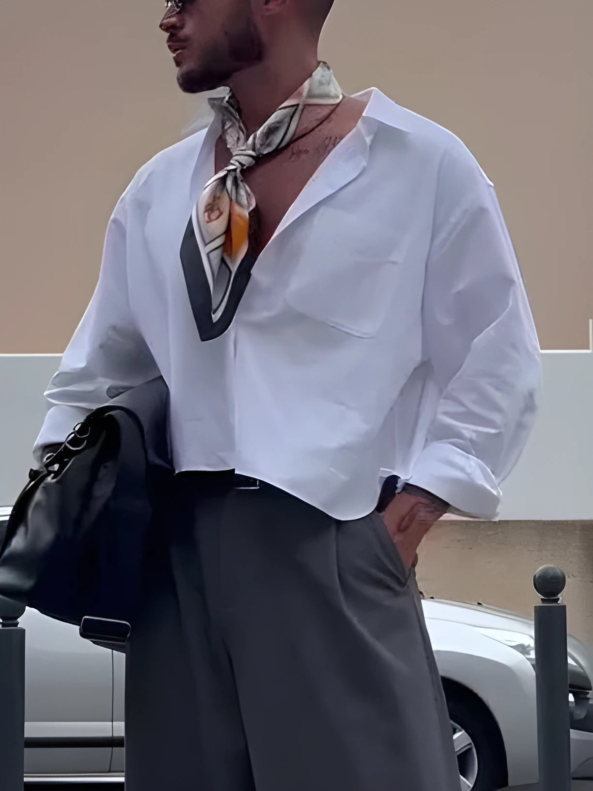 Men's solid white short-sleeve casual shirt with a cropped length.