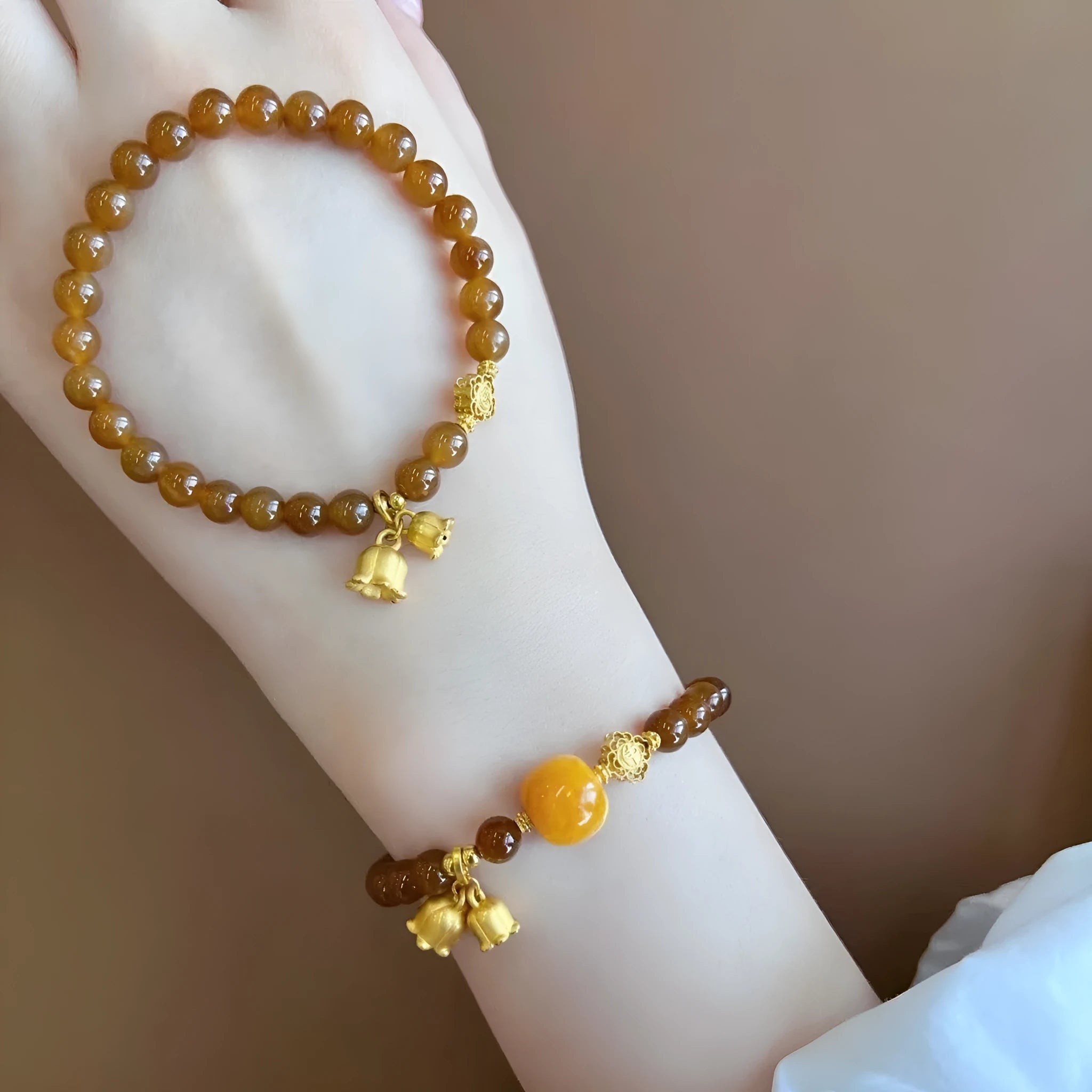Caramel beeswax Lily bracelet with electroplated finish and floral design