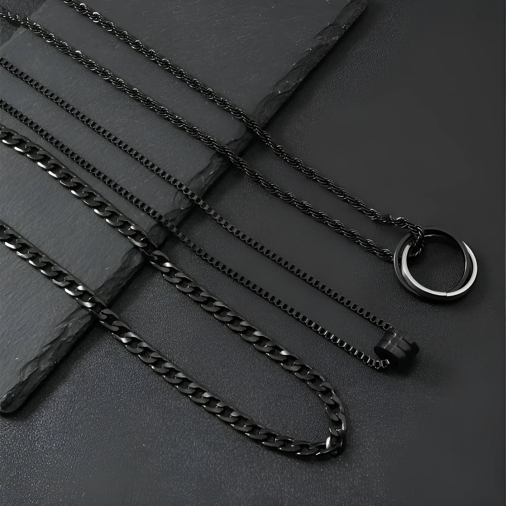 Men's black stainless steel necklace set with geometric titanium steel pendant.