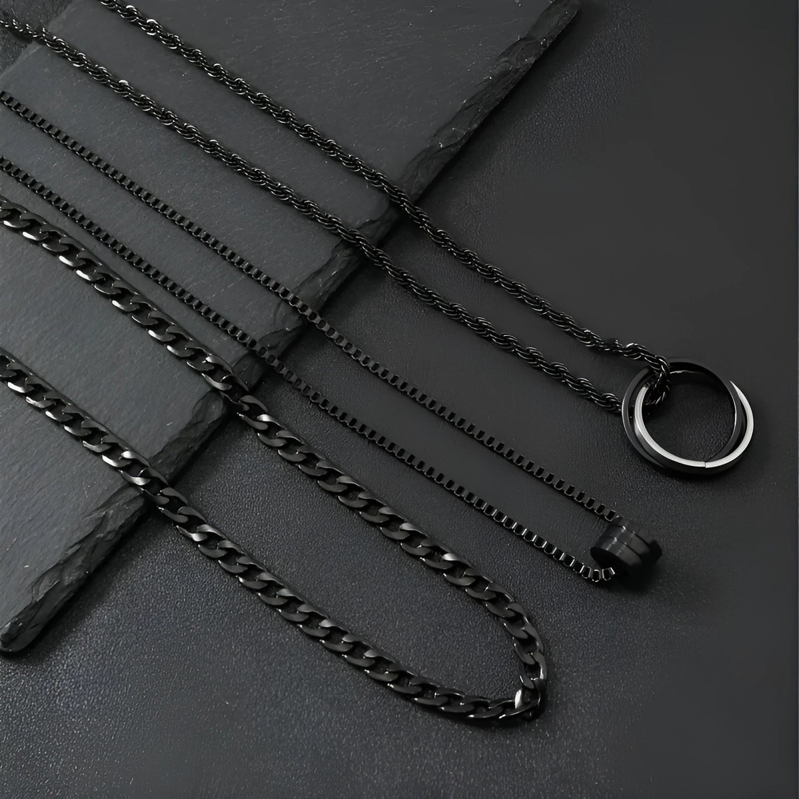 Men's black stainless steel necklace set with geometric titanium steel pendant.