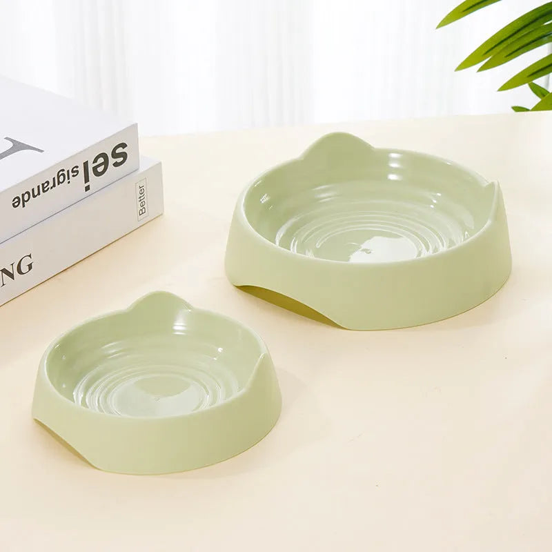 Ceramic dog slow feeder bowl with puzzle cups in blue, shown in large and small sizes.