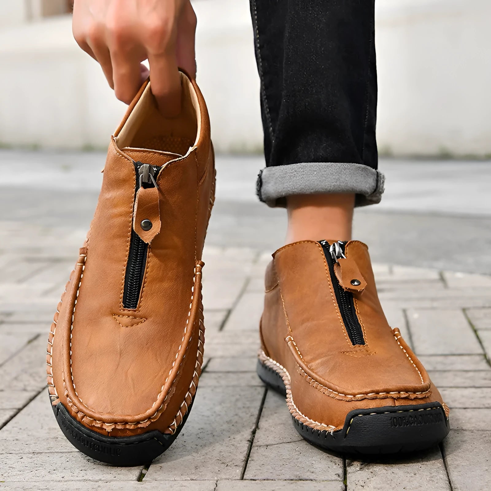 Men's black slip-on loafers with round toe and low flat rubber sole