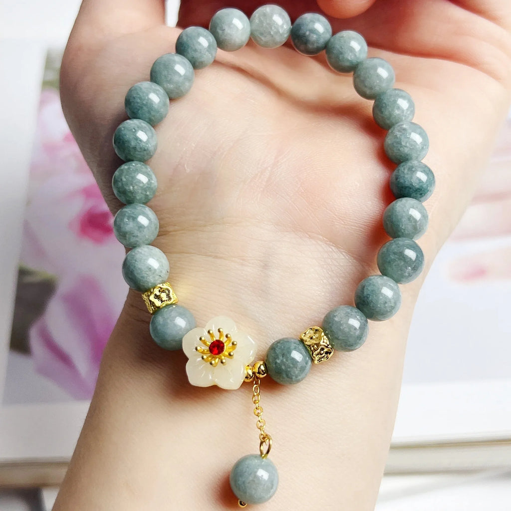 Women's adjustable jade bracelet with retro style and rope closure on wrist