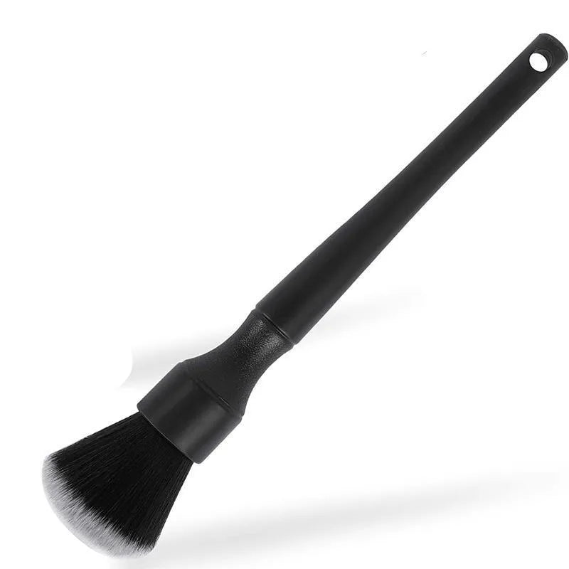 Black car detailing brush with ultra-soft pig hair bristles in two size options for gentle interior cleaning