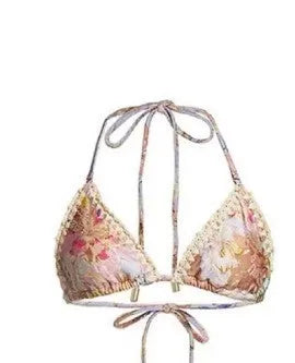 Women's floral print bikini set with top, briefs, and removable skirt in creamy-white colour