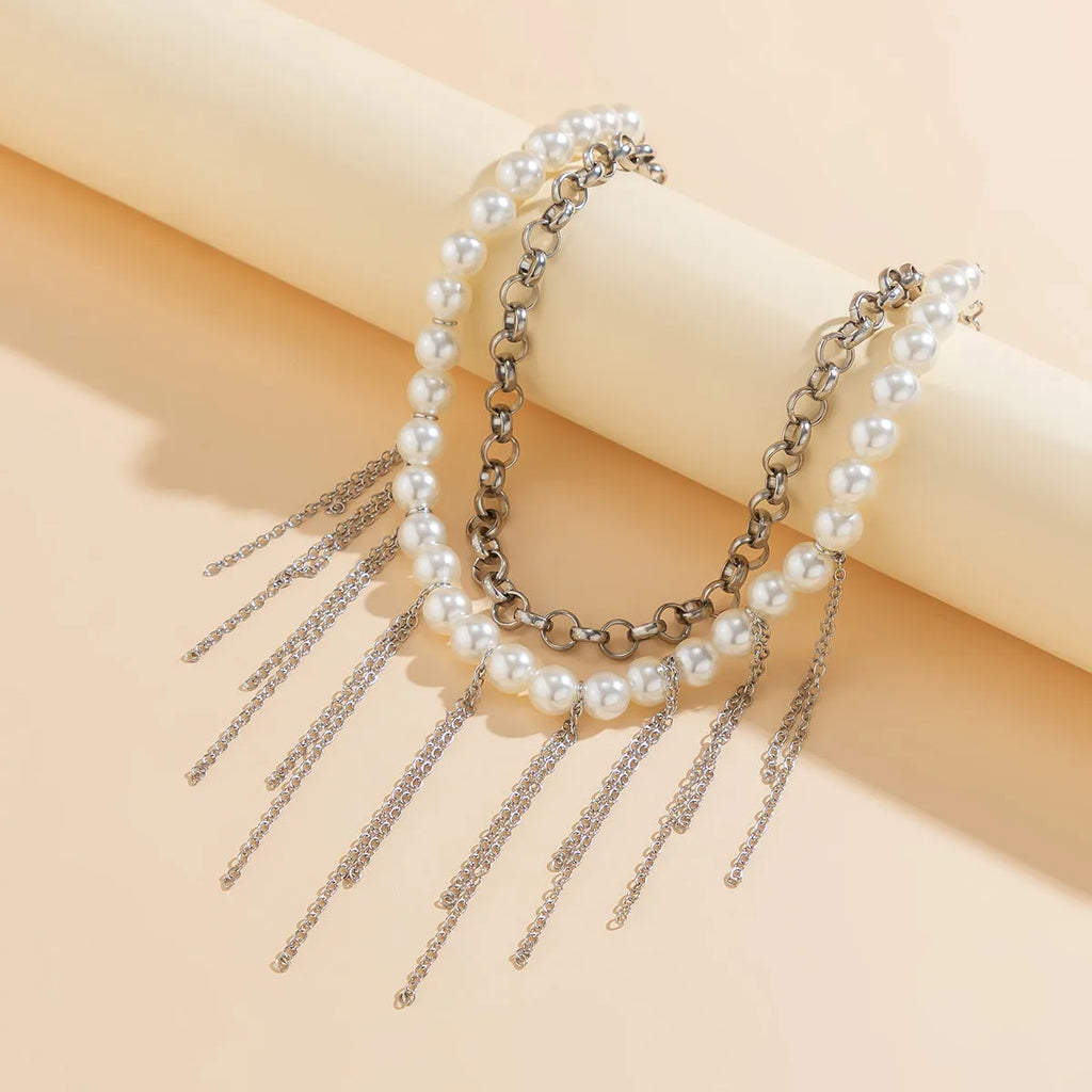 Women's double-layer retro necklace with white K electroplated finish, iron pendant, and imitation pearl tassel design