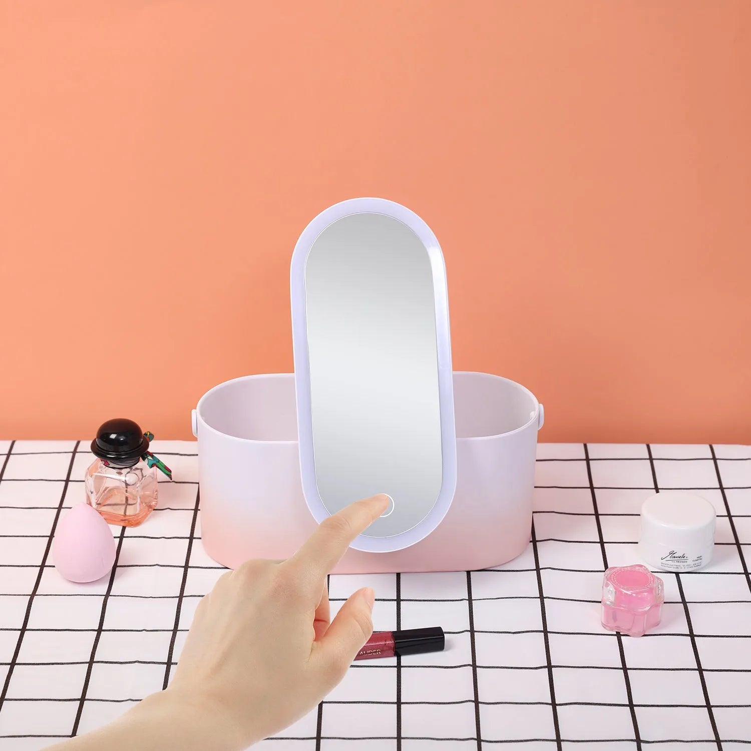 Pink gradient portable LED makeup mirror storage box open to show organisers and mirror