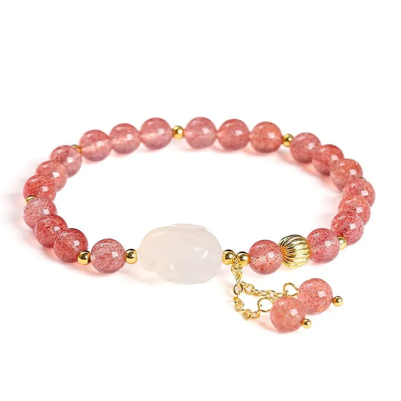 Natural strawberry quartz and agate bracelet for women with 6mm round beads and a white rabbit charm.