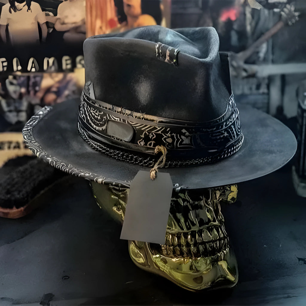 Handmade conical skull hat crafted from wool felt and denim fabric in a dark colour.