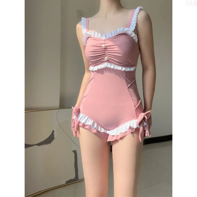 Women's milk silk one-piece swimsuit in solid pink or blue colour for sun protection swimming
