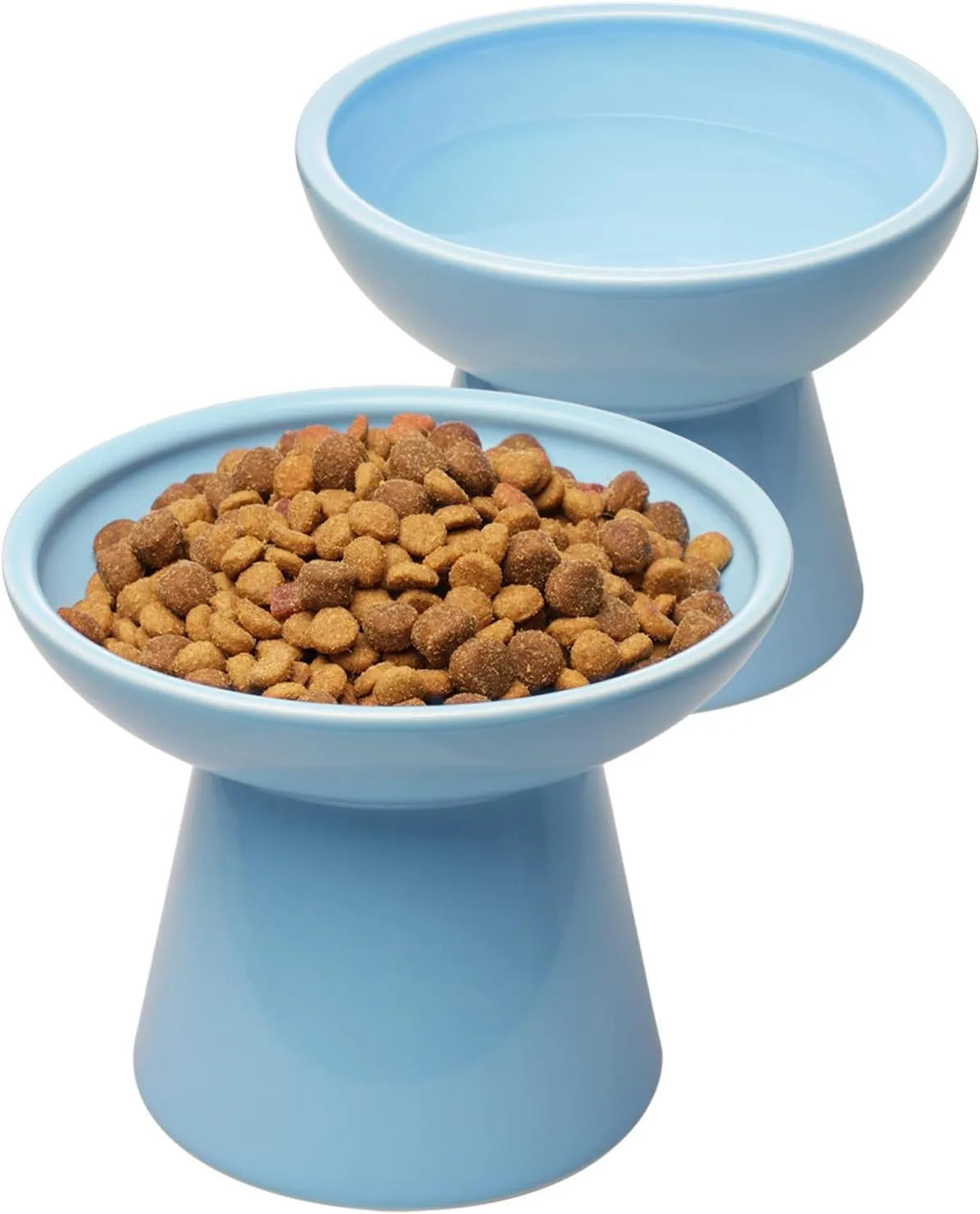Blue elevated ceramic cat food bowl on a white surface