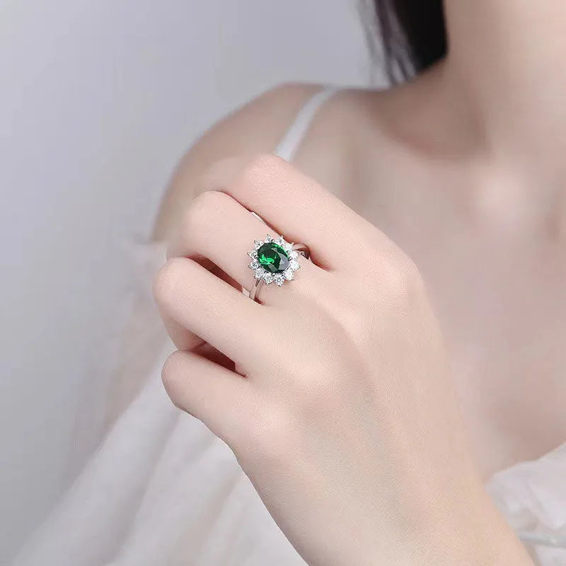 Blue moissanite copper flower ring with electroplated finish shown on finger