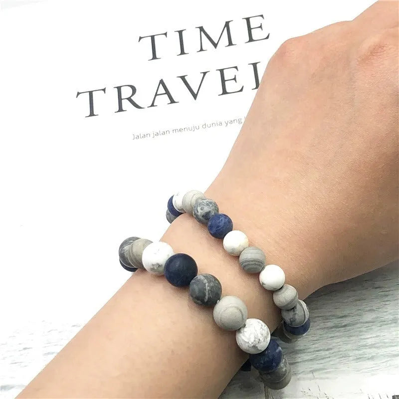 Handmade unisex U-shaped bracelet with natural planet stone beads in 8mm, 10mm, or 12mm sizes.