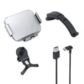 Grey wireless charging phone holder for cars with vent clip and suction cup mount options on a dashboard.