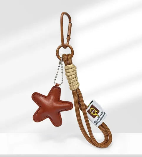 Handmade polymer clay soda bread handbag pendant with adjustable brown strap and glossy baking varnish finish