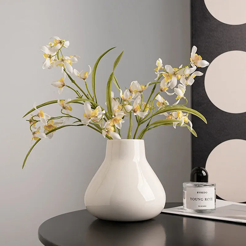 Ceramic vase with glass surface in black or white colour featuring coloured glaze finish and modern simple style