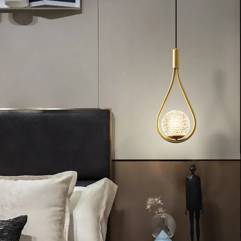 Modern minimalist copper bedside chandelier with a choice of three shade colours and a tricolour light source.