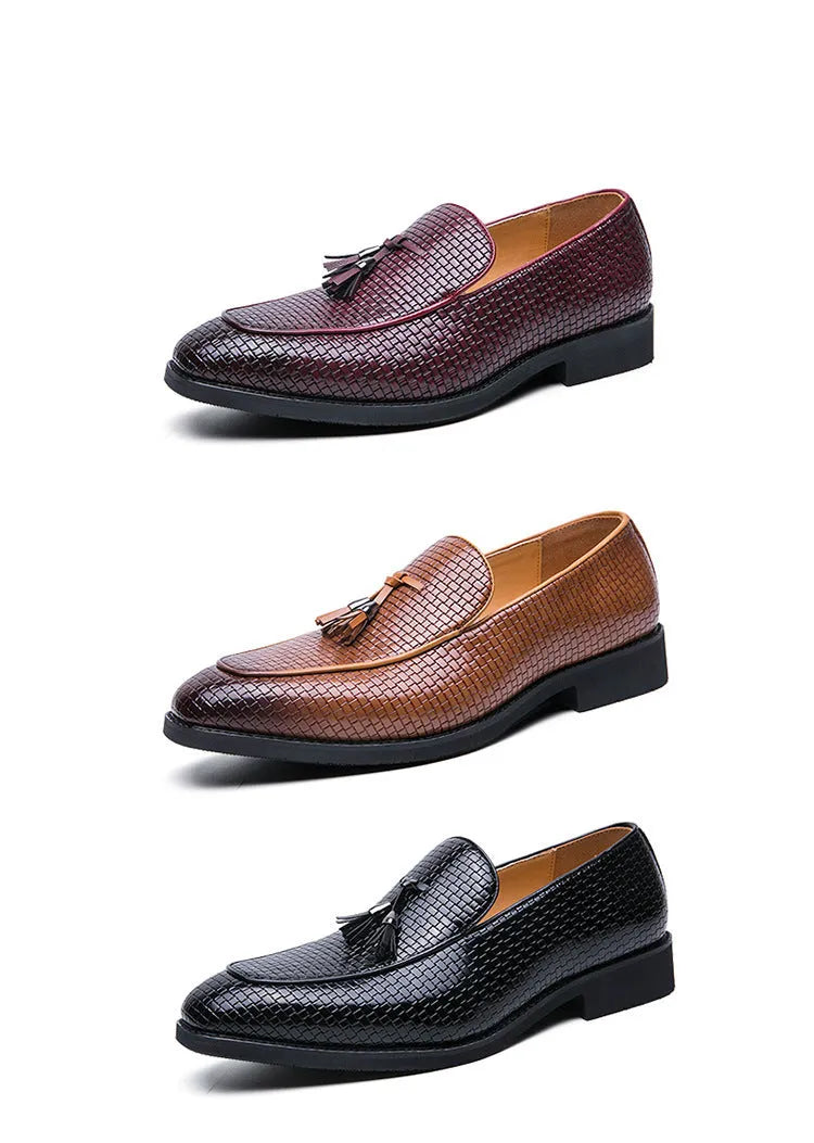 Men's black pointed-toe slip-on shoes with a tassel detail on the low-top PU upper.