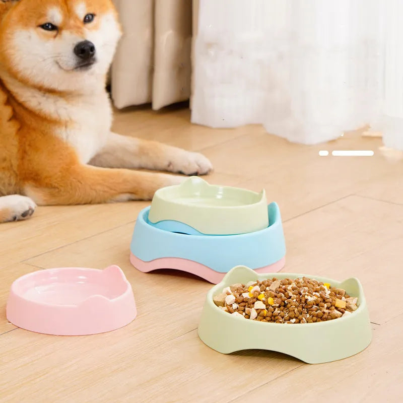 Ceramic dog slow feeder bowl with puzzle cups in blue, shown in large and small sizes.
