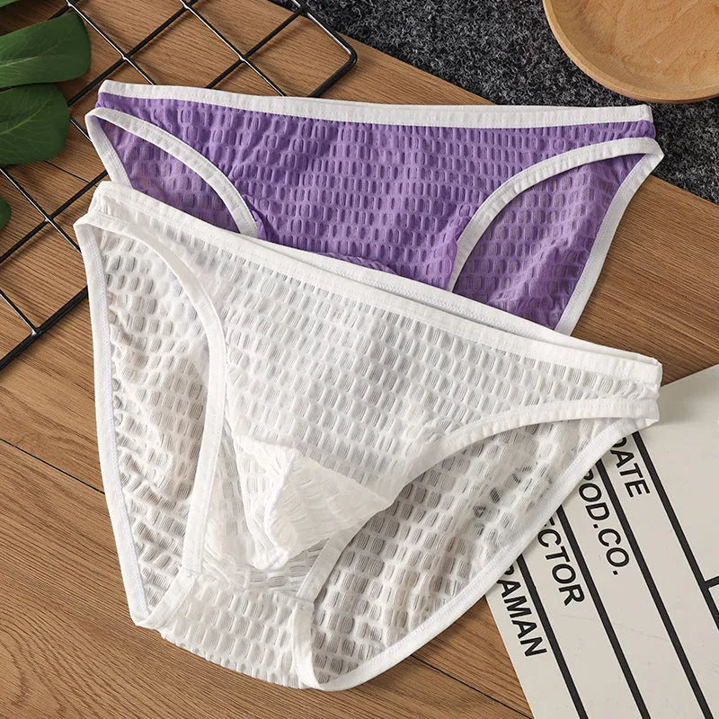 Men's low waist transparent lace underwear shorts in black, green, light purple, rose red, and white colours.