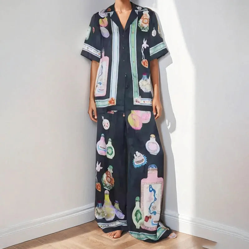Black women's casual set with cartoon pattern featuring cardigan top and trousers