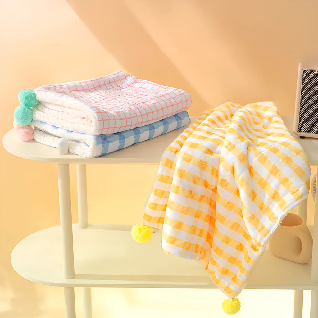 Blue coral fleece pet blanket shown on a dog bed, with size options S, M, L, XL displayed.