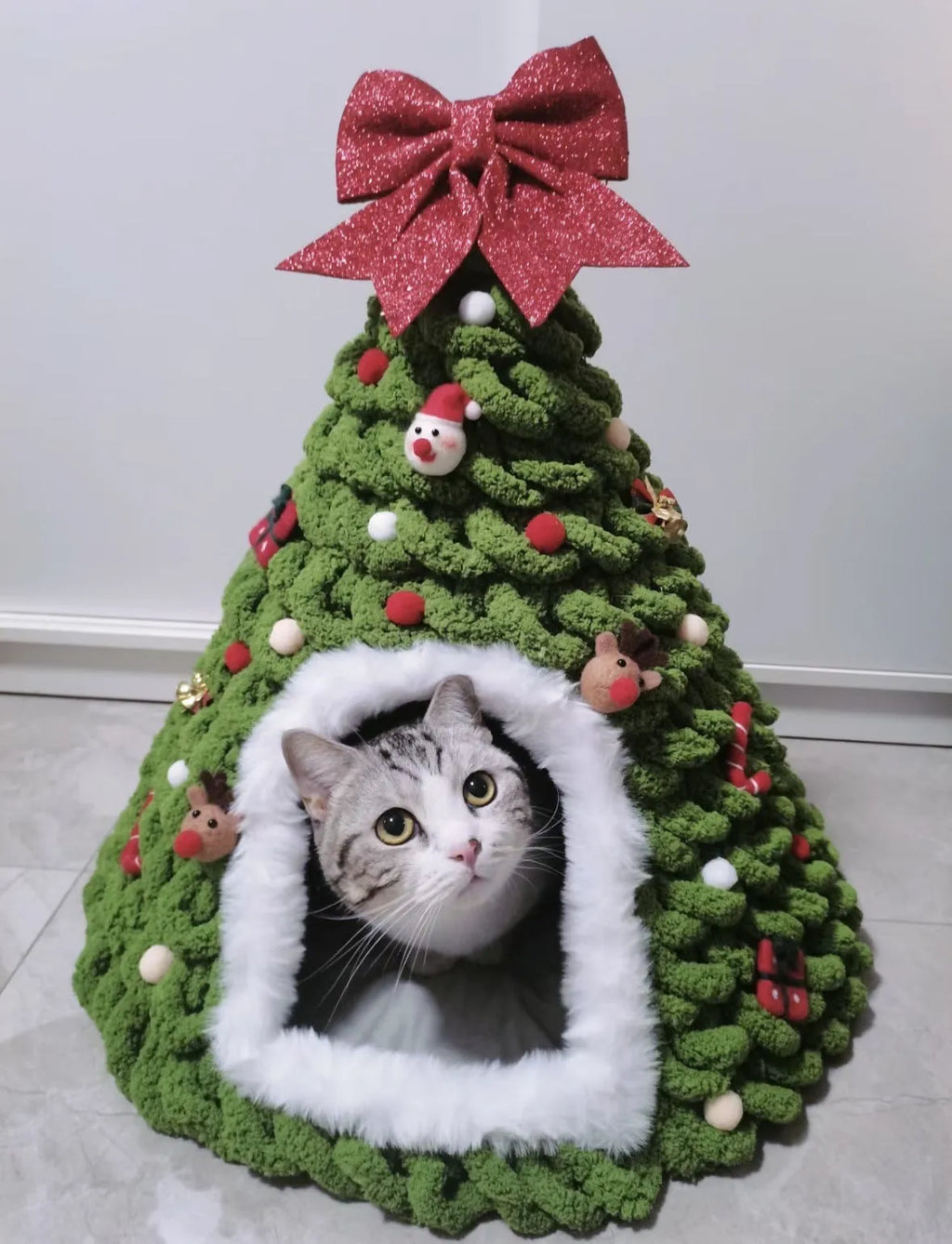 Grey handmade felt cone-shaped cat house with enclosed tent-style design