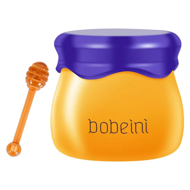 Vaseline lip balm pot with small brush, 9g net, in blueberry or pomegranate flavour