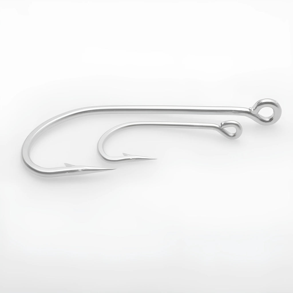 Assortment of multi-specification alloy sea fishing hooks for boat fishing on a blue background.