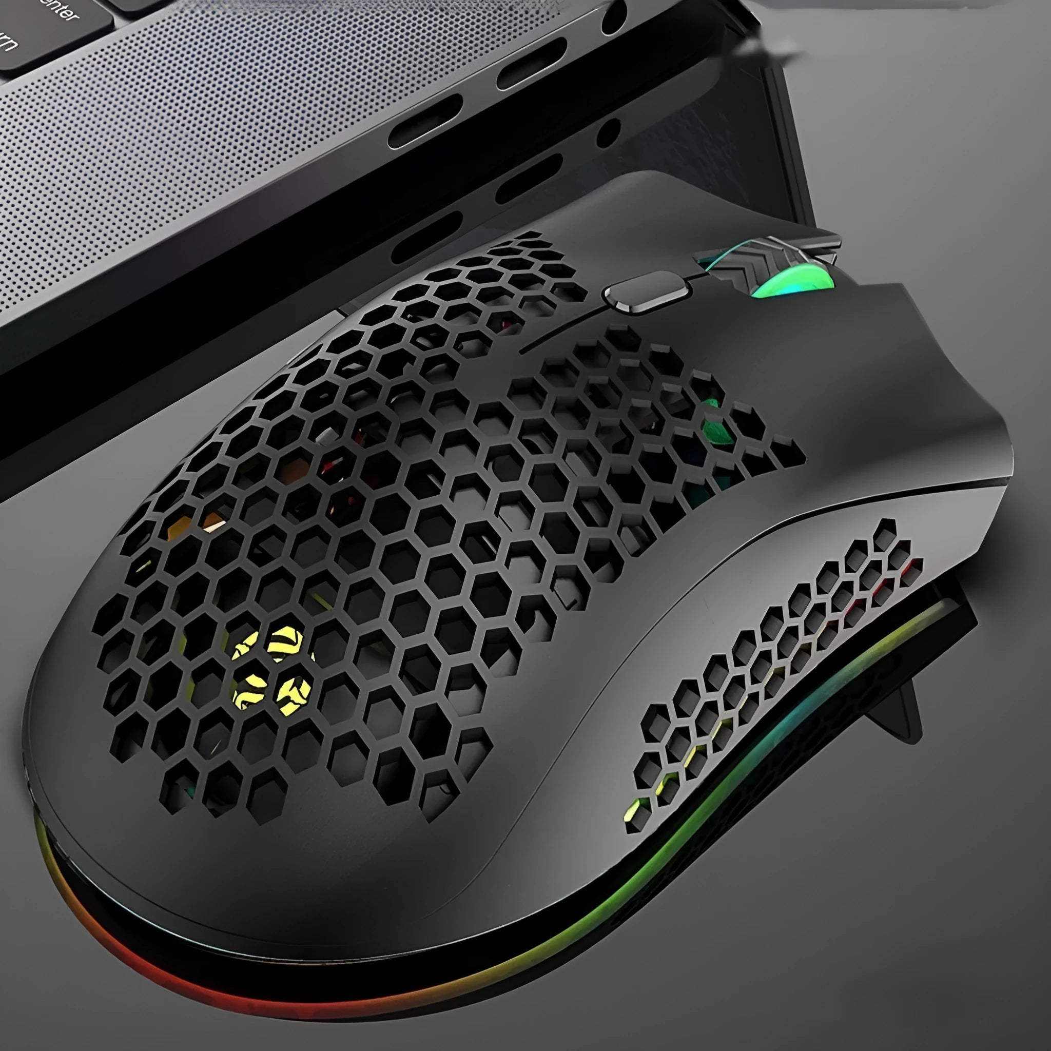 BM600 hollow-out wireless gaming mouse with luminous charging in cyan, black, or white colours.