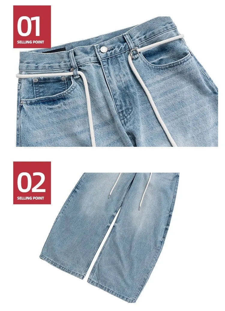Blue vintage washed straight-leg denim trousers with drawstring waistband and zipper fly