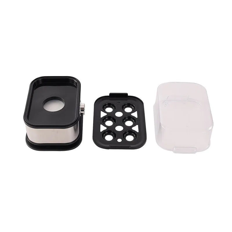Black portable stainless steel egg boiler with international power adapters for travel use