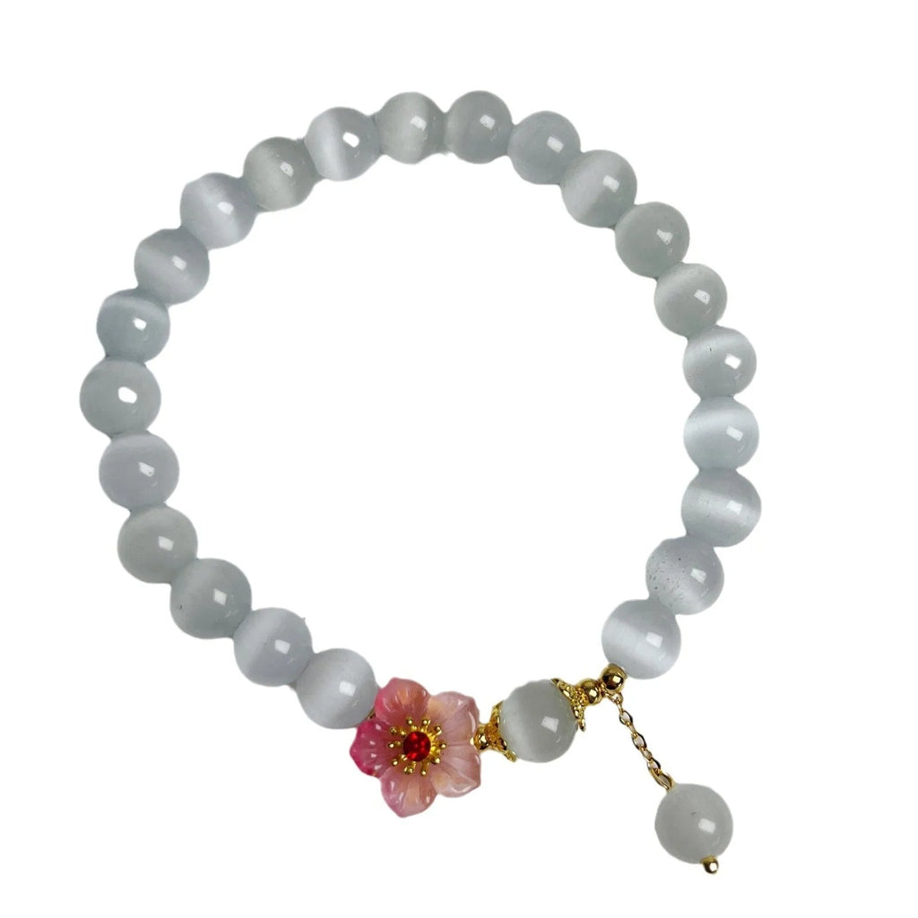 White opal flower beaded bracelet handmade from glass and coloured glaze jewellery