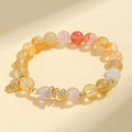 Women's lucky snake bracelet with crystal beads, plastic flowers, and a beast pattern design.