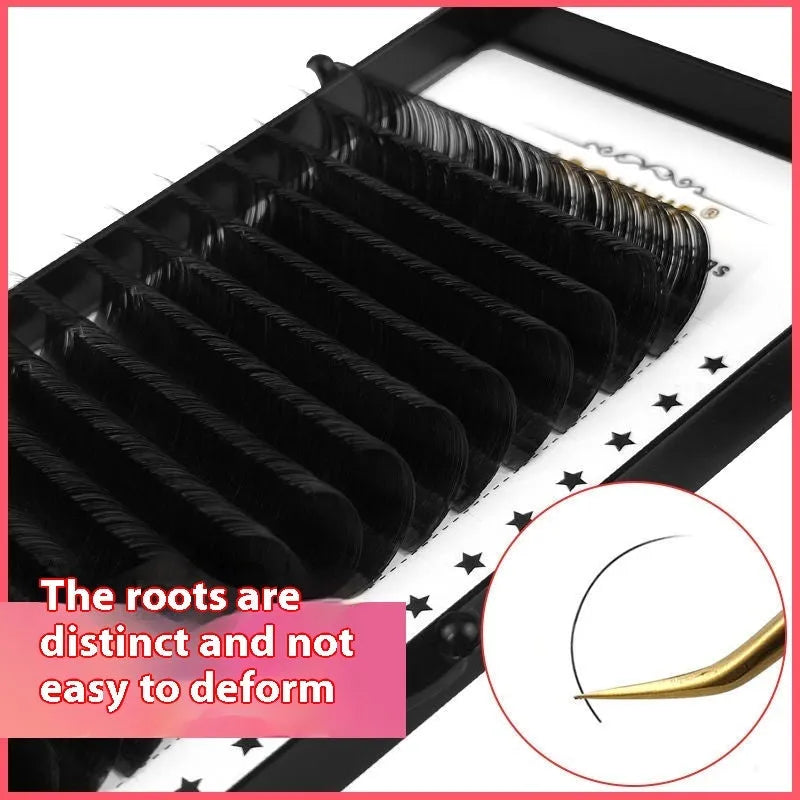 Close-up of dense 16-row matte mink hair false eyelashes on a clear band, showing natural finish.