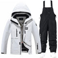 Blue and black unisex waterproof winter ski suit with top and pants for snow sports