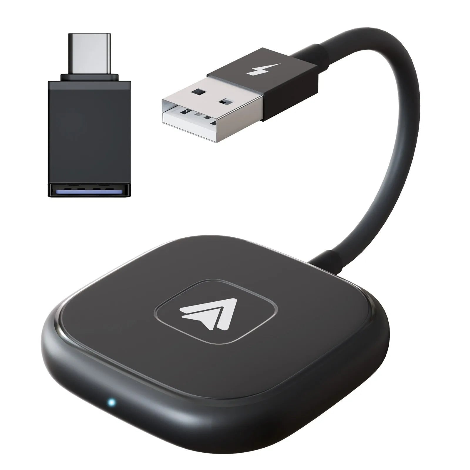 Black and white wireless Carplay adaptor for Android phones next to a car steering wheel