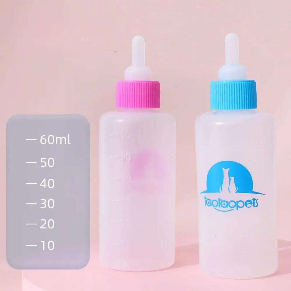 Set of four coloured pet milk bottle feeders with silicone teats and a cleaning brush for small animals.