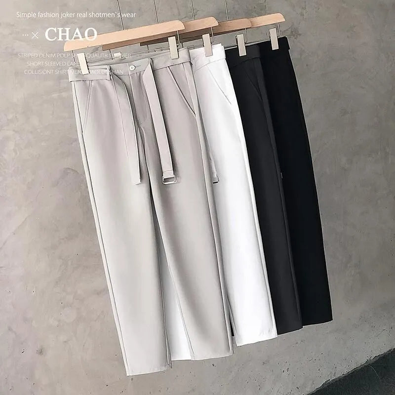 Boys slim straight wool trousers in tapered cut for business casual and street fashion.