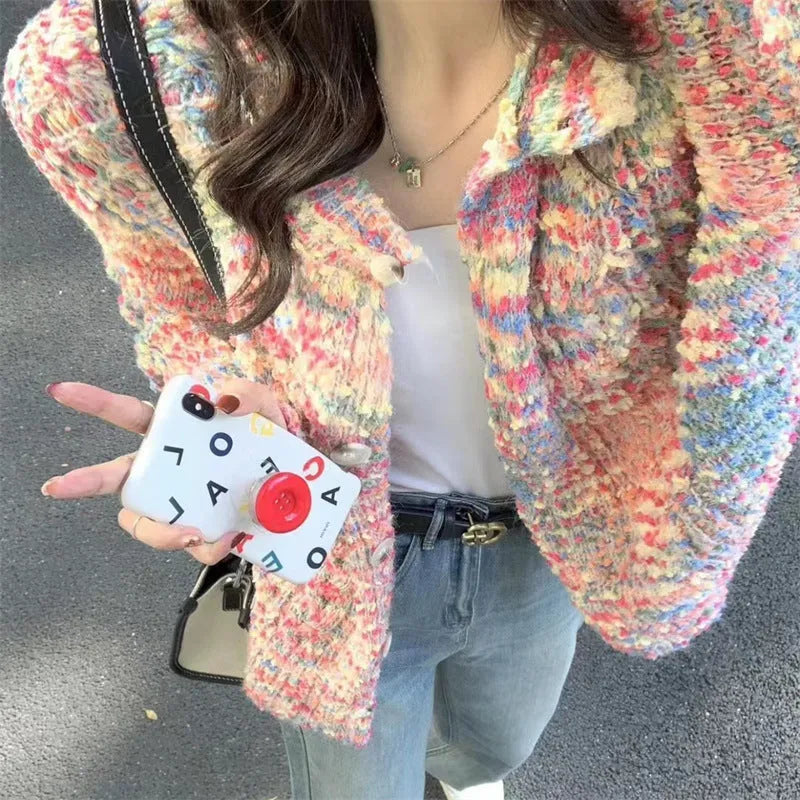 Rainbow pattern knitted cardigan in pink and green colours with toothbrush hair texture