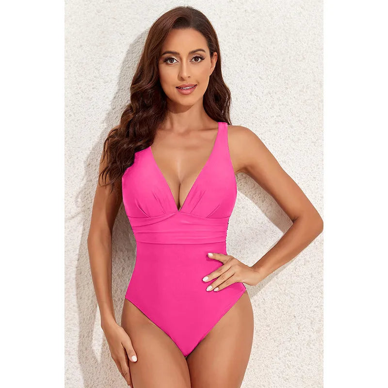 Women's minimalist cross-shoulder one-piece swimsuit in solid colour
