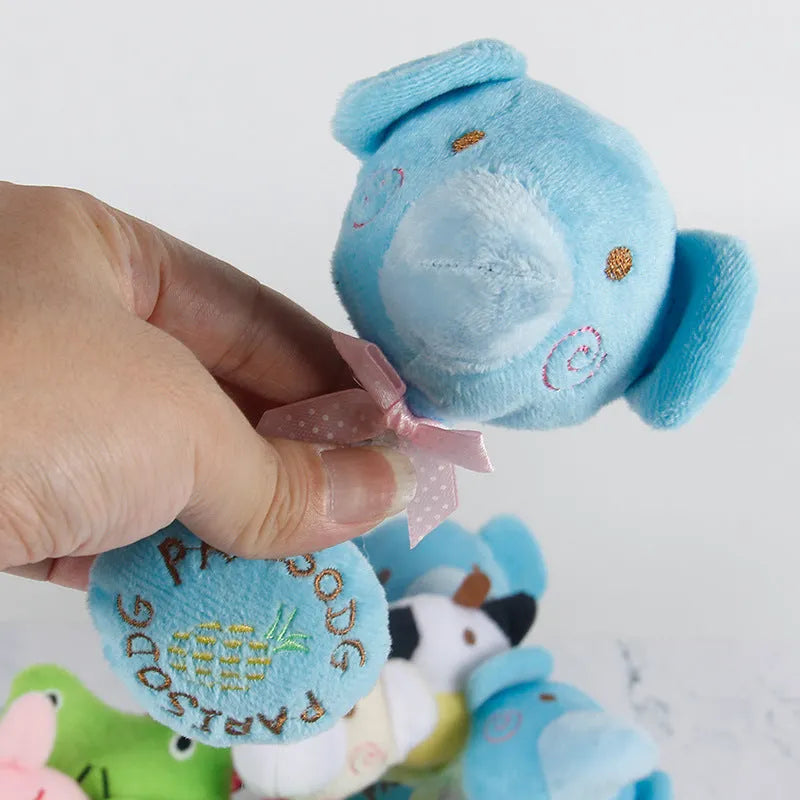 Animal shaped plush dog toy with cotton rope details and squeaker for chewing