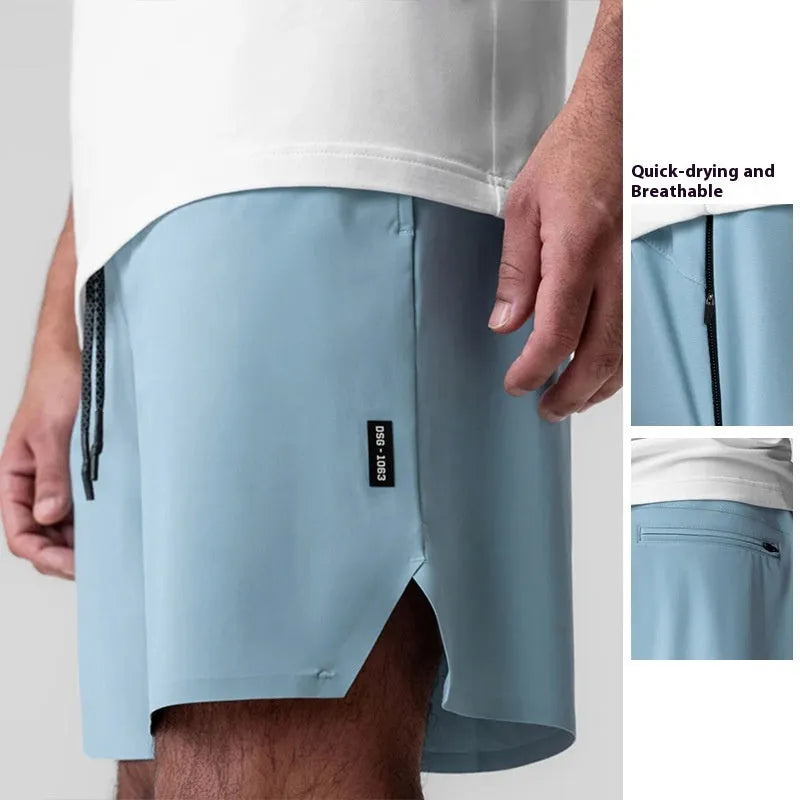 Men's grey seamless sports shorts with knee-length straight-leg cut on a plain background
