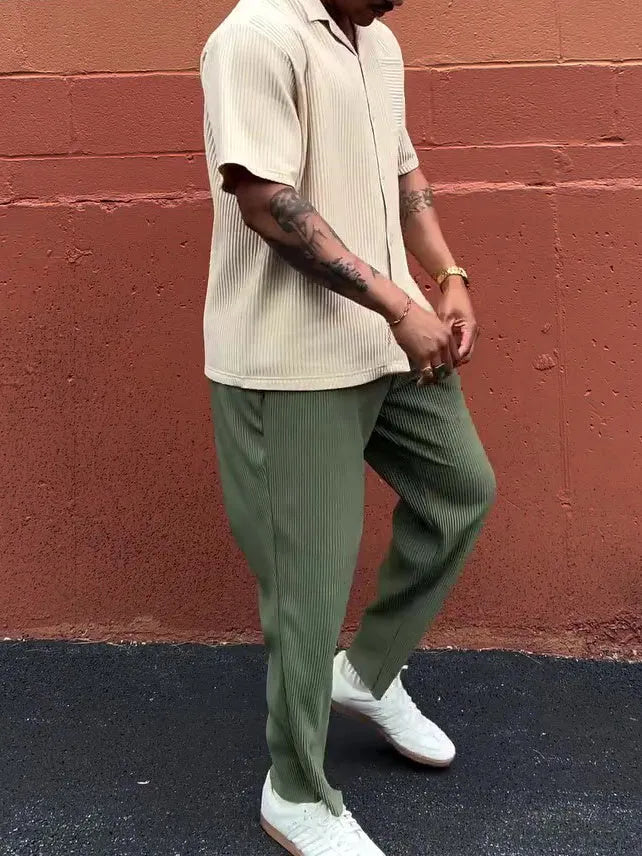 Men's green pleated casual trousers with ankle-length cut and regular fit